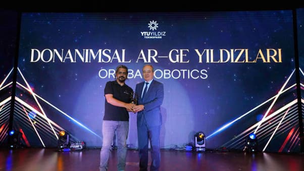 Orbiba Robotics team receiving a technology award